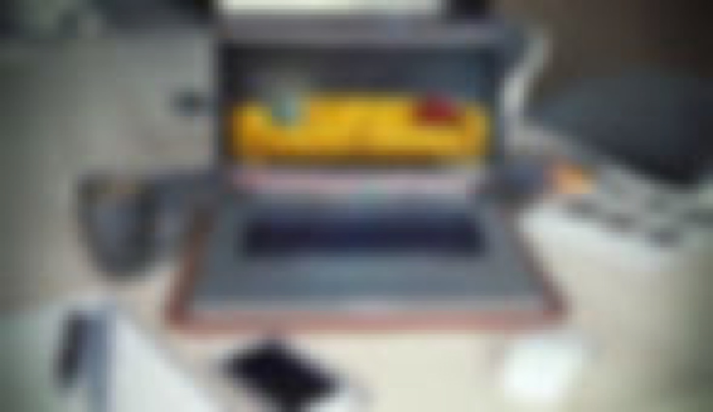 picture of a laptop with a example of e-commerce template
